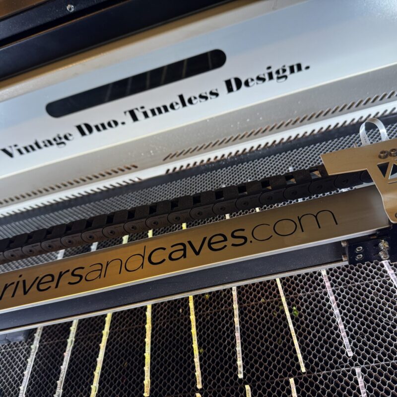 Image of a laser engraver for Rivers and Caves makers of small batch custom and personalized drink stirrers and swizzle sticks